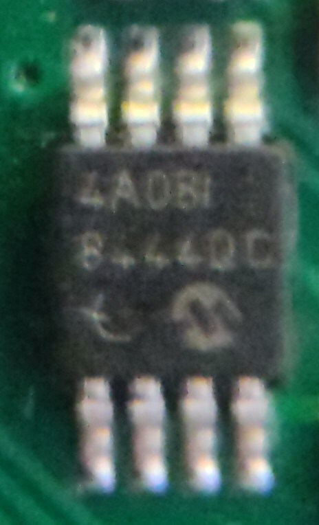 8-pin IC 
Microchip logo bottom right
Code reads:
"4A081
8444QC"
